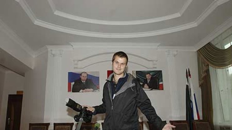 Человек с фотоаппаратом