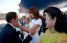 Президент Франции Николя Саркози и первая леди Франции Карла Бруни