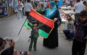 Ребенок в образе Муаммара Каддафи в Бенгази