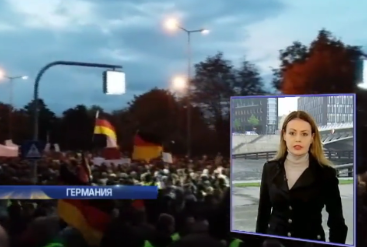 На митингах в Германии требуют отставки Ангелы Меркель