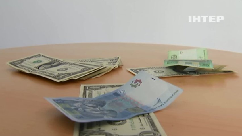 Закон о "лохах": как украинцы реагируют на доллар по 5,05 (видео)