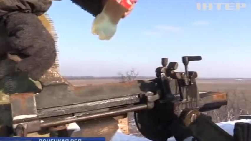 Под Донецком военные спасают оружие от мороза